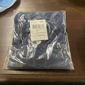 The Children’s Place never opened or worn 5T navy blue boys polo.